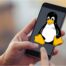afbeelding smartphone met linux mascotte